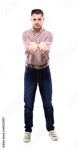Photo: Handsome casual man smiling - isolated over a white background Handsome casual man smiling - isolated over a white background