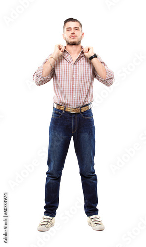 Photo: Handsome casual man smiling - isolated over a white background Handsome casual man smiling - isolated over a white background