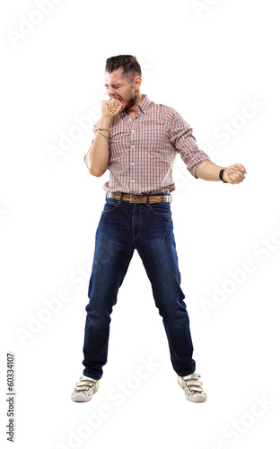 Photo: happy young man celebrating success on white background happy young man celebrating success on white background