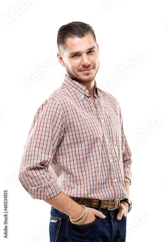 Photo: Casual young man looking at camera Casual young man looking at camera