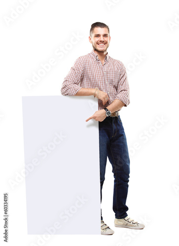 Photo: Happy business man presenting your text isolated on white Happy business man presenting your text isolated on white