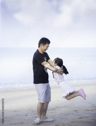 Photo: Happy family on the beach Happy family on the beach