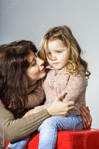 Photo: Mother reassuring little daughter Mother reassuring little daughter