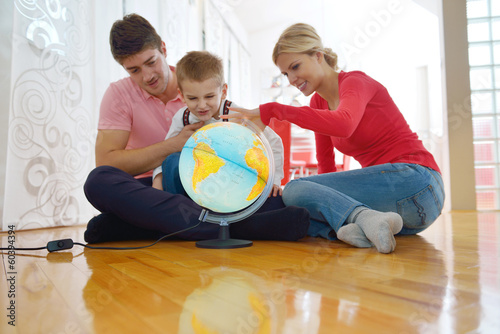 Photo: family have fun with globe family have fun with globe