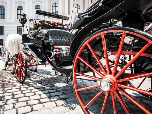 Photo: Traditional Fiaker carriage at Hofburg in Vienna, Austria Traditional Fiaker carriage at Hofburg in Vienna, Austria