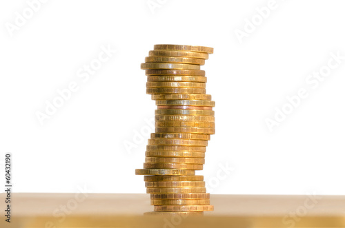 Photo: A stack of coins, isolated on white background A stack of coins, isolated on white background