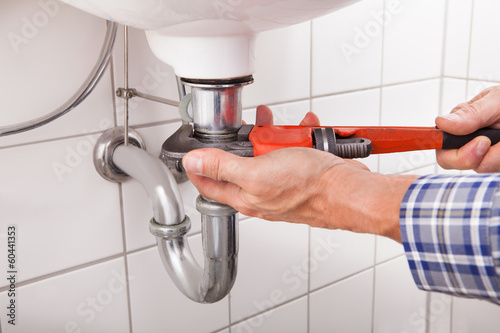 Photo: Plumber Fitting Sink Pipe Plumber Fitting Sink Pipe