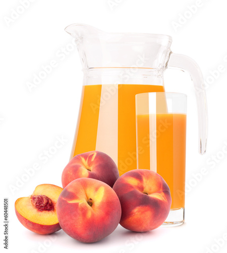 Photo: Peach fruit juice in glass jug Peach fruit juice in glass jug