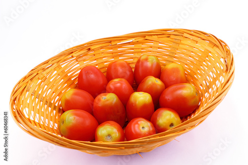 Photo: Fresh tomatoes in a basket Fresh tomatoes in a basket