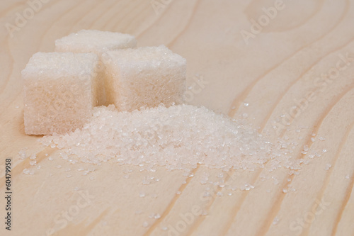 Photo: Sugar on a wooden surface Sugar on a wooden surface