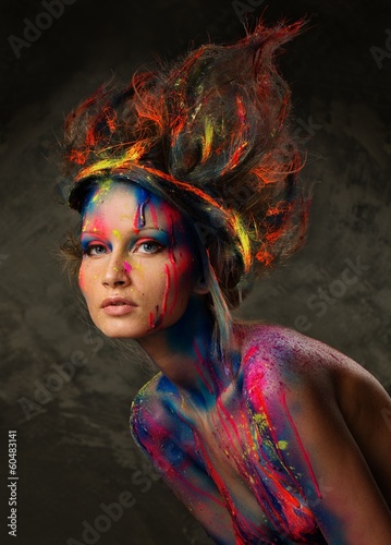 Photo: Young woman muse with creative body art and hairdo Young woman muse with creative body art and hairdo