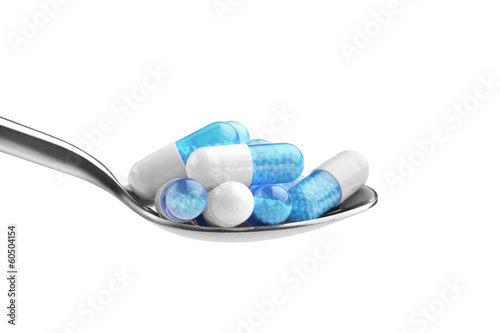 Photo: pills on a spoon pills on a spoon