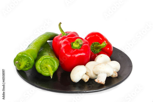 Photo: Red and green peppers and some mushrooms. Red and green peppers and some mushrooms.