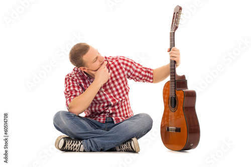 Photo: Young musician with a guitar Young musician with a guitar