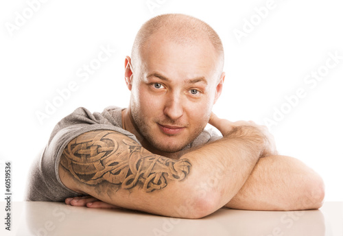 Photo: Man with tattoo Man with tattoo