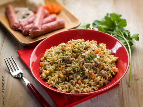 Photo: rice with sausage, selective focus rice with sausage, selective focus