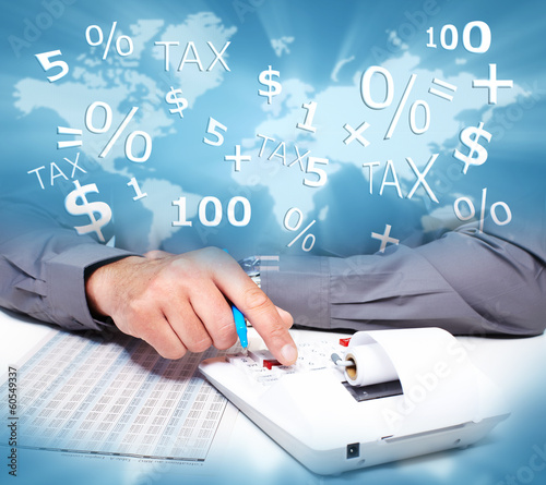 Photo: Hands of business people with calculator. Hands of business people with calculator.