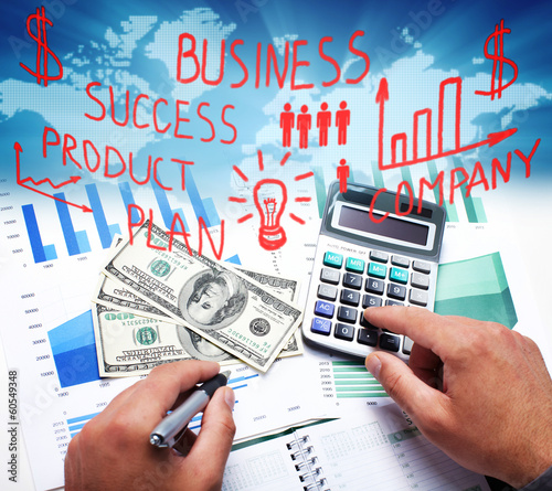 Photo: Hands of business people with calculator. Hands of business people with calculator.
