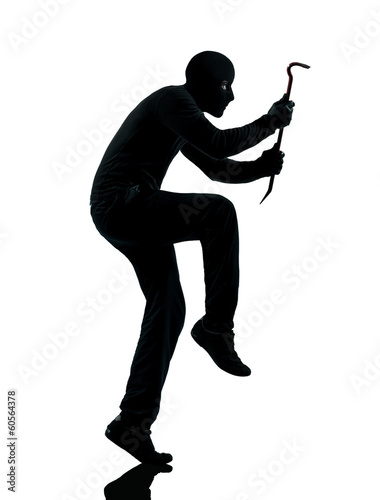 Photo: thief criminal walking quiet silhouette thief criminal walking quiet silhouette