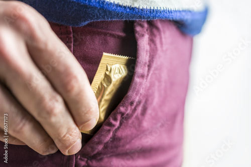 Photo: Pulling out a condom Pulling out a condom