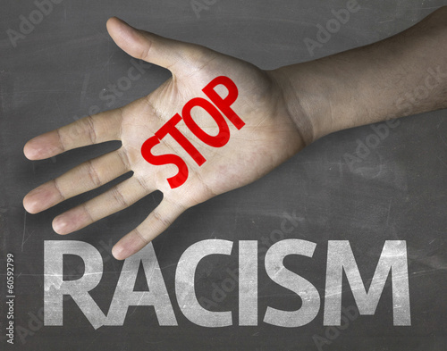 Photo: Educational composition with a hand painted Stop Racism Educational composition with a hand painted Stop Racism