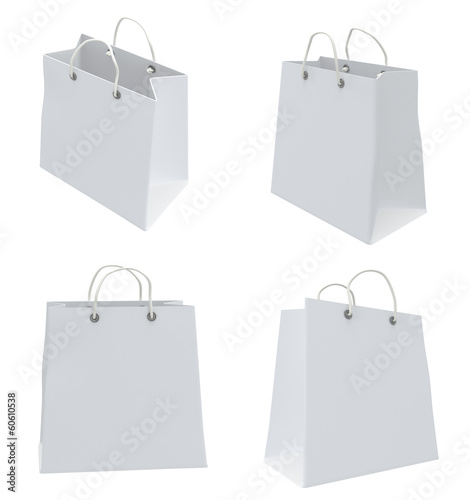 Illustration: Set of four classic white shopping bags. 3d. Set of four classic white shopping bags. 3d.
