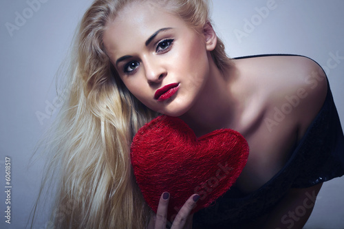 Photo: Sexy Beautiful Blond Woman with Red Heart.Valentine's Day Sexy Beautiful Blond Woman with Red Heart.Valentine's Day