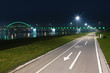 Bicycle lane and bridge at night Bicycle lane and bridge at night
