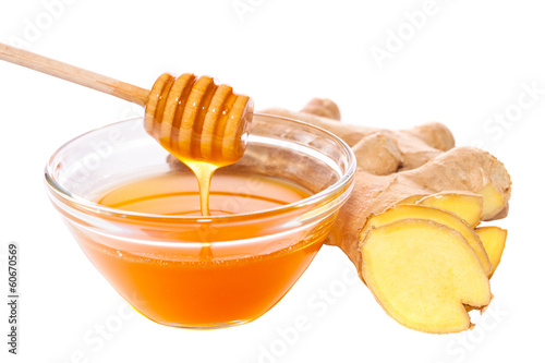 Photo: honey and ginger isolated with path honey and ginger isolated with path