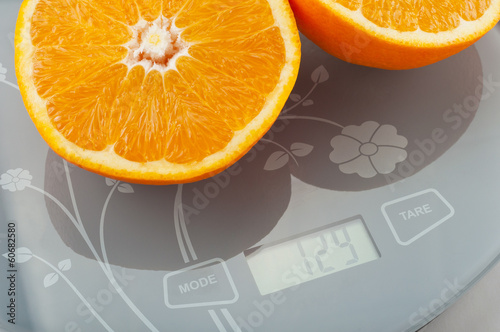 Photo: orange on the scale. orange on the scale.