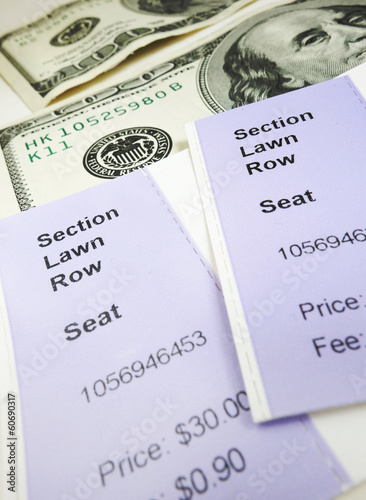 Photo: tickets and cash tickets and cash
