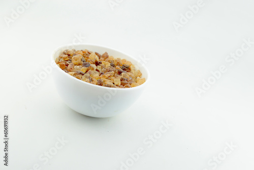 Photo: Crystals cane sugar on a white backgraund Crystals cane sugar on a white backgraund