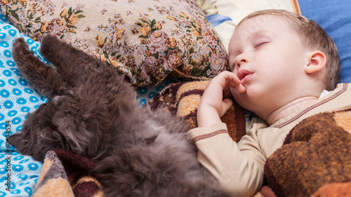 Photo: Boy sleeps with cat Boy sleeps with cat
