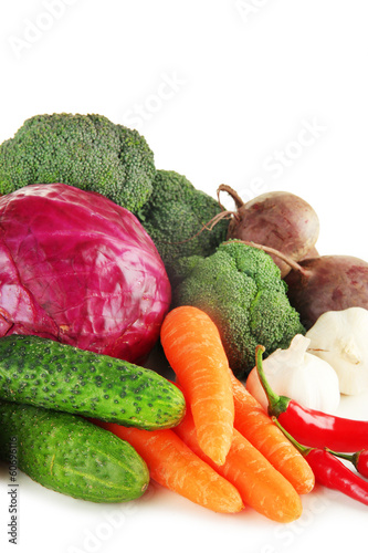 Photo: Composition of different vegetables isolated on white Composition of different vegetables isolated on white