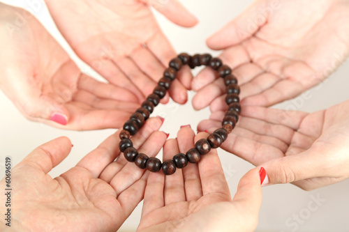 Photo: Muslim praying hands on light background Muslim praying hands on light background