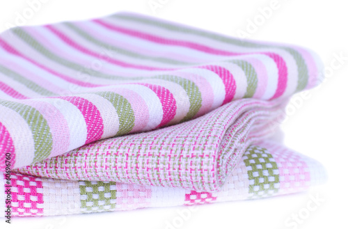 Photo: Kitchen towels isolated on white Kitchen towels isolated on white