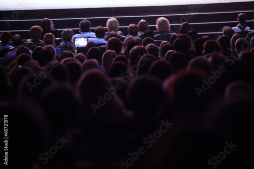 Photo: People watching cinema People watching cinema