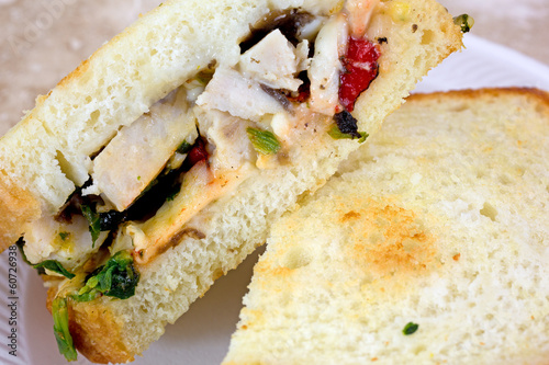 Photo: Close view of chicken sandwich cut in half Close view of chicken sandwich cut in half