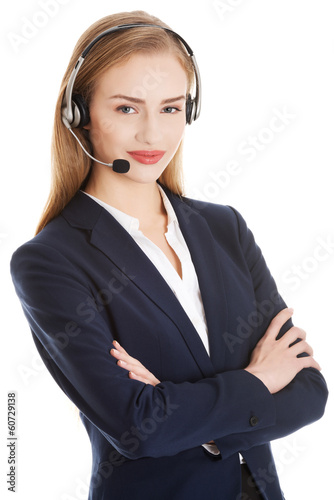 Photo: Beautiful caucasian business woman at call center. Beautiful caucasian business woman at call center.