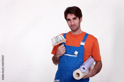 Photo: Man holding wallpaper Man holding wallpaper