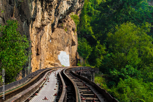 Photo: Dead railway beside cliff, along Kwai river in Thailand Dead railway beside cliff, along Kwai river in Thailand