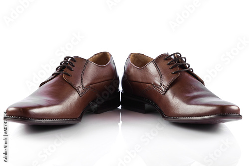 Photo: Male shoes. man's shoes isolated on white background Male shoes. man's shoes isolated on white background