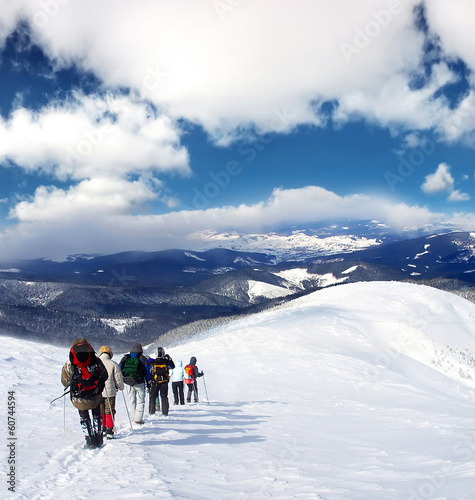 Photo: Climbers team on the snowy mountain. Sport concept Climbers team on the snowy mountain. Sport concept