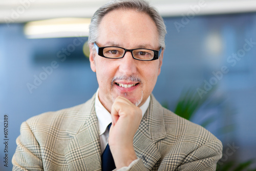 Photo: Smiling businessman Smiling businessman