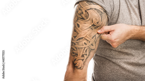 Photo: Man with tattoo Man with tattoo