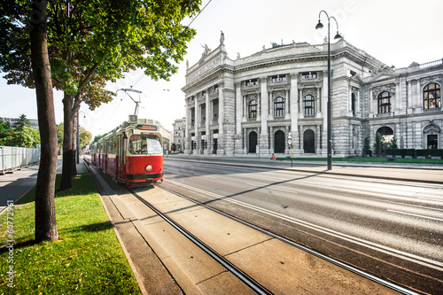 Photo: Famous Ringstrasse with Burgtheater and tram in Vienna, Austria Famous Ringstrasse with Burgtheater and tram in Vienna, Austria