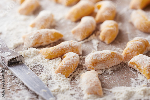 Photo: Raw pumpkin gnocchi close-up Raw pumpkin gnocchi close-up