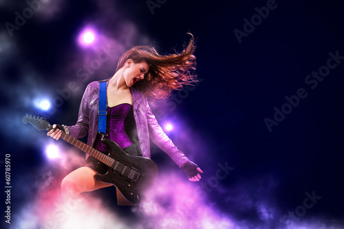 Photo: Rock passionate girl with black wings Rock passionate girl with black wings