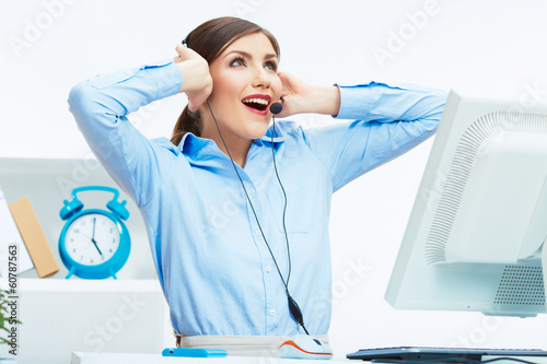 Photo: Portrait of woman customer service worker, call center smiling Portrait of woman customer service worker, call center smiling