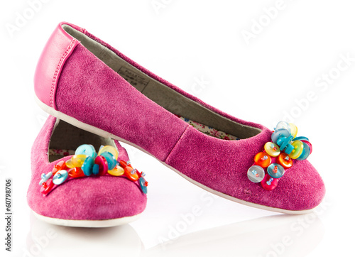 Photo: girl shoes isolated on white. girl shoes isolated on white.